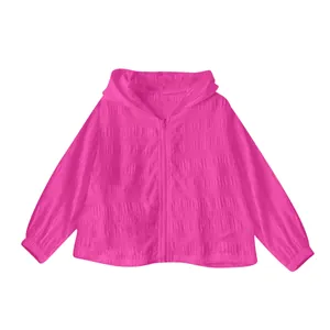 Detailed front view of women's pink jacquard textured sun protection jacket with hood