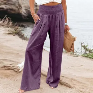 Detailed macro shot of purple high-waisted cotton linen wide-leg trousers for summer