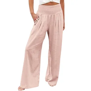 Front view of women's casual wide-leg cotton linen trousers in salmon pink finish