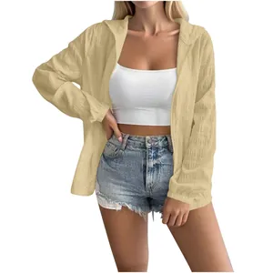Lightweight beige long-sleeve hooded sun protection jacket with textured jacquard fabric.