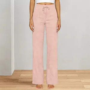 Detail view of dusty pink high-waisted wide-leg yoga pants with drawstring and pockets.
