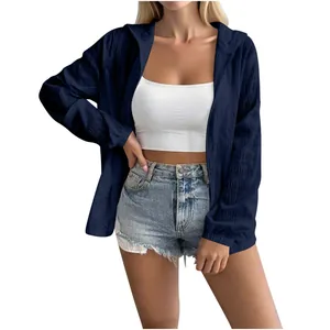 Detail of navy blue jacquard sun protection jacket with long sleeves and hood for women