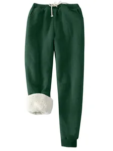 Dicke dunkelgrüne Winter-Jogginghose für Damen mit weißem Sherpa-Futter und Kordelzug