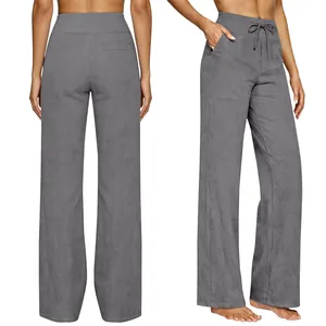 Front and back view of gray high-waisted wide-leg trousers with drawstring and pockets