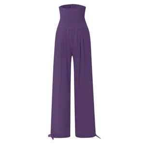 Pantaloni viola a vita alta a gamba larga con vita arricciata e coulisse sul fondo.