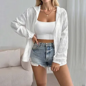 Detailed look at the white jacquard textured hooded sun protection jacket for women