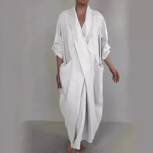Elegant white oversized V-neck robe dress with large side pockets and loose fit