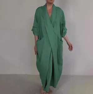 Comfortable solid green V-neck maxi bathrobe dress featuring oversized side pockets.