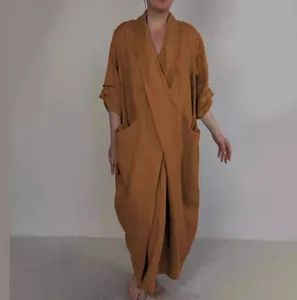 Detailed view of ginger loose V-neck bathrobe dress featuring oversized side pockets
