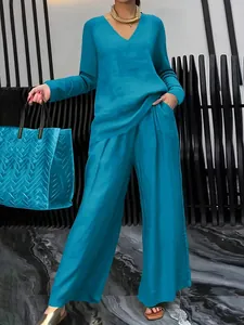 Elegantes türkisfarbenes zweiteiliges Freizeitset mit V-Ausschnitt und Hose