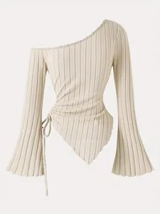 Elegant cream ribbed one-shoulder top with flared sleeves and asymmetrical hemline detail.