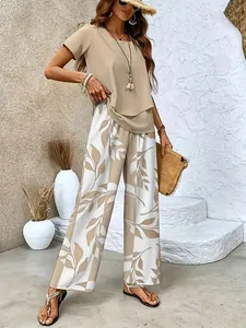 Bohemian style women's two-piece set featuring leaf print wide-leg pants and top