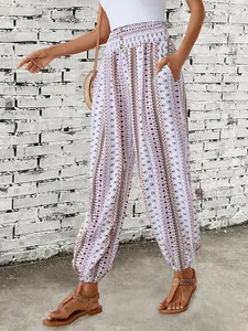 Bohemian ethnic pattern printed pants with high-waisted elastic smock detail