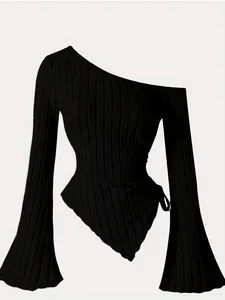 Detail of black ribbed one-shoulder top featuring dramatic flared sleeves and asymmetric hem.