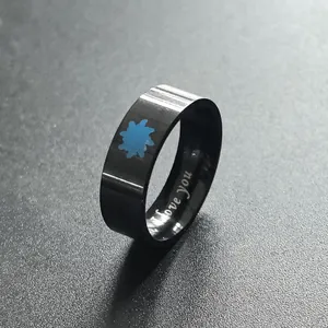 Close-up of black stainless steel ring with blue sun icon and I love you engraving