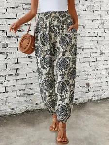 Bohemian ethnic print harem trousers with elastic waist and intricate damask patterns