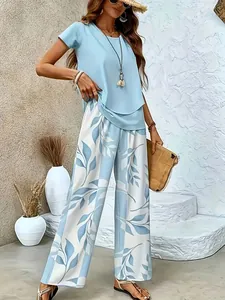 Detail showing light blue top and leaf print wide-leg pants set for women