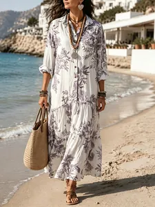 Full-body detail view of Bohemian floral print long sleeve pleated maxi shirt dress