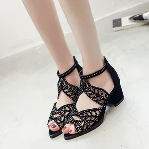 Black hollow-out block heel sandals with sparkling rhinestones and an open toe design