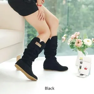 Detail of women's black suede mid-calf boots with slouchy design and lace trim