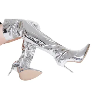 Detailed side view of silver metallic over-the-knee boots with stiletto high heels