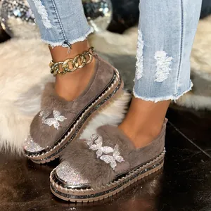 Elegant brown suede loafers featuring fur collar and sparkling rhinestone butterfly motifs