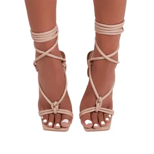 Sexy beige lace-up square toe high heel sandals for women shown from the front view