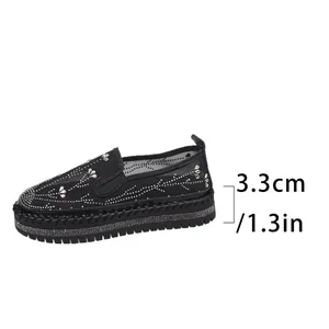 Detail view of black rhinestone platform loafers showing 3.3cm sole height for women