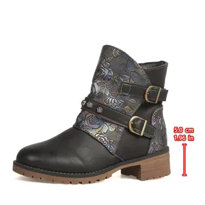 Side view detail showing the 5.0cm heel height of the floral embossed cowboy boot