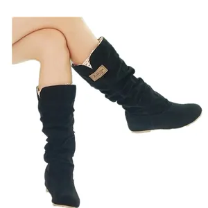 Stylish women's black suede mid-calf slouch boots with lace trim and flat rubber sole
