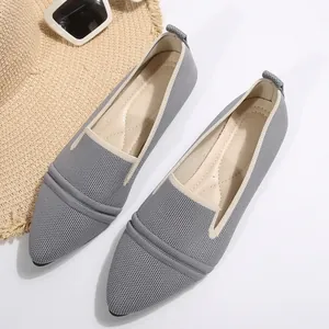 Elegant grey pointed-toe knit flats with breathable mesh fabric and cushioned insoles