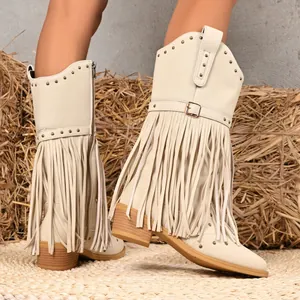 Chic beige western cowboy boots for women featuring fringe rivets and buckle detail