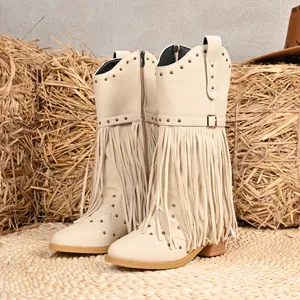 Cream Western cowboy mid-calf boots with fringe and rivets, pointed toe chunky heel style