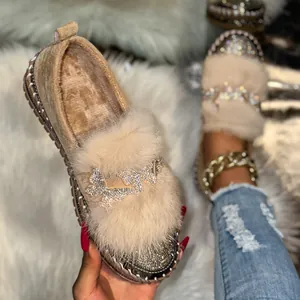 Winter women's platform loafers featuring soft fur trim and a luxury rhinestone butterfly