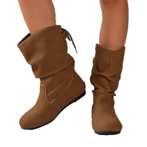 Brown suede slouch boots for women with back tie detail and comfortable flat soles