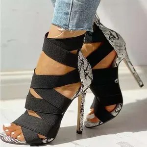 Sexy snake print Roman sandals with black cross elastic straps and stiletto heels
