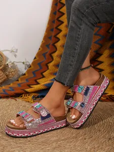 Detailed view of bohemian rhinestone platform sandals with double buckle straps