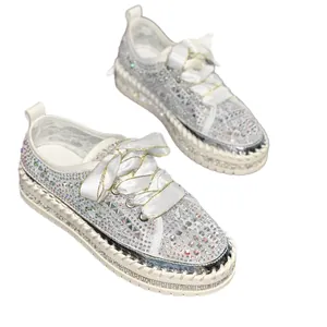 Women's white platform sneakers with colorful rhinestones and elegant satin laces