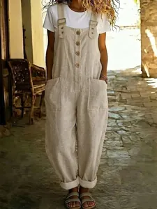 Detailansicht eines beigen Vintage-Jumpsuits aus Baumwolle und Leinen mit Taschen