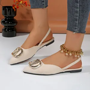 Elegant beige pointed-toe slingback flats with decorative gold buckle for women.