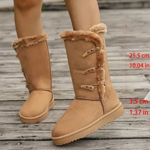 Winter snow boots with toggle buttons and plush lining, showing shaft and sole height