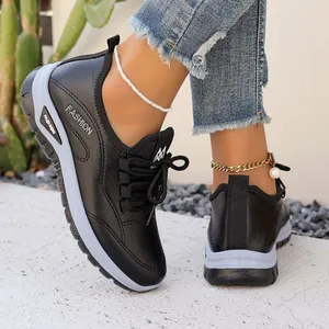 Women's stylish black lace-up platform sneakers with breathable upper and thick soles