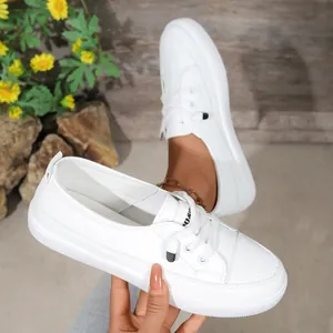 Minimalist women's white casual sneakers with elegant lace-up design and thick comfort sole