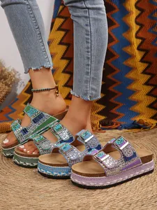 Detailed view of rhinestone-embellished platform cork sandals in multiple colors