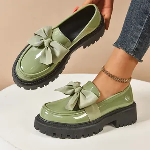 Elegant light green patent leather bow loafers with chunky platform sole for women