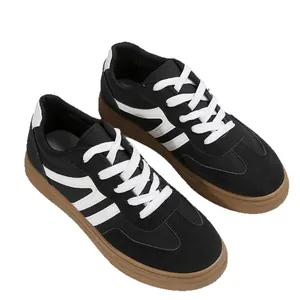 Retro zwarte dames sneakers in Duitse trainerstijl met gomzool en witte strepen