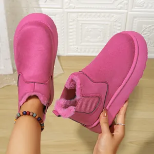 Vibrant hot pink platform snow boots for women with warm faux fur lining and round toe.