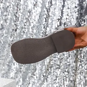Detailed close-up of the textured non-slip rubber sole of the square toe Martin boot
