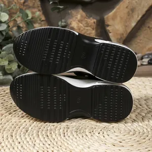 Detailed macro view of the textured non-slip platform sole on casual women's sandals