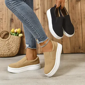 Stylish women's thick-sole slip-on sneakers shown in khaki and black suede finish